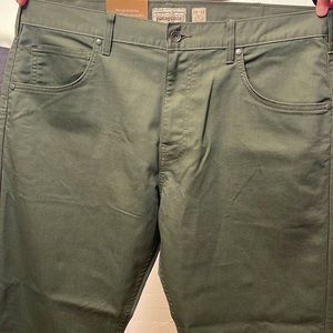 Men’s deep green Patagonia pants.